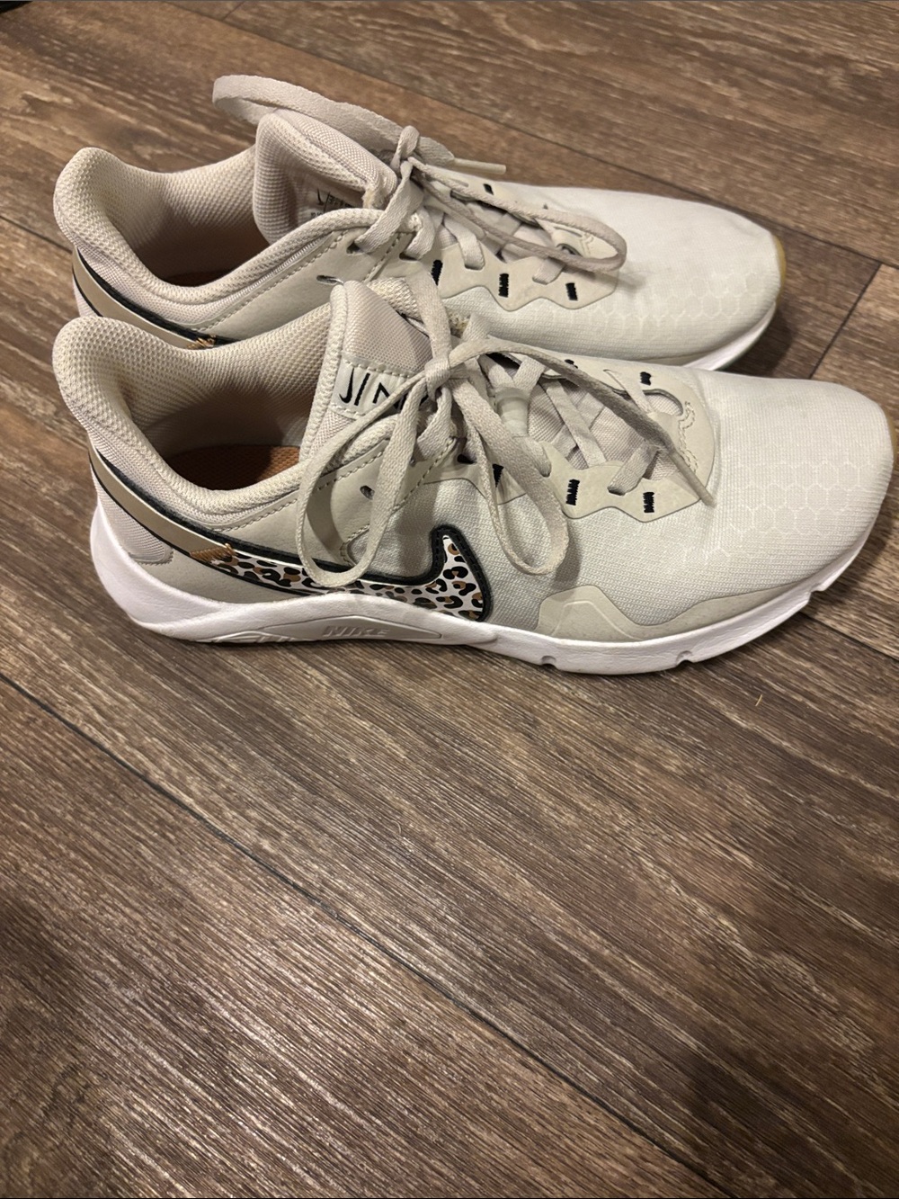 Nike Women’s Light Beige Running Shoes with Leopard-Print Swoosh